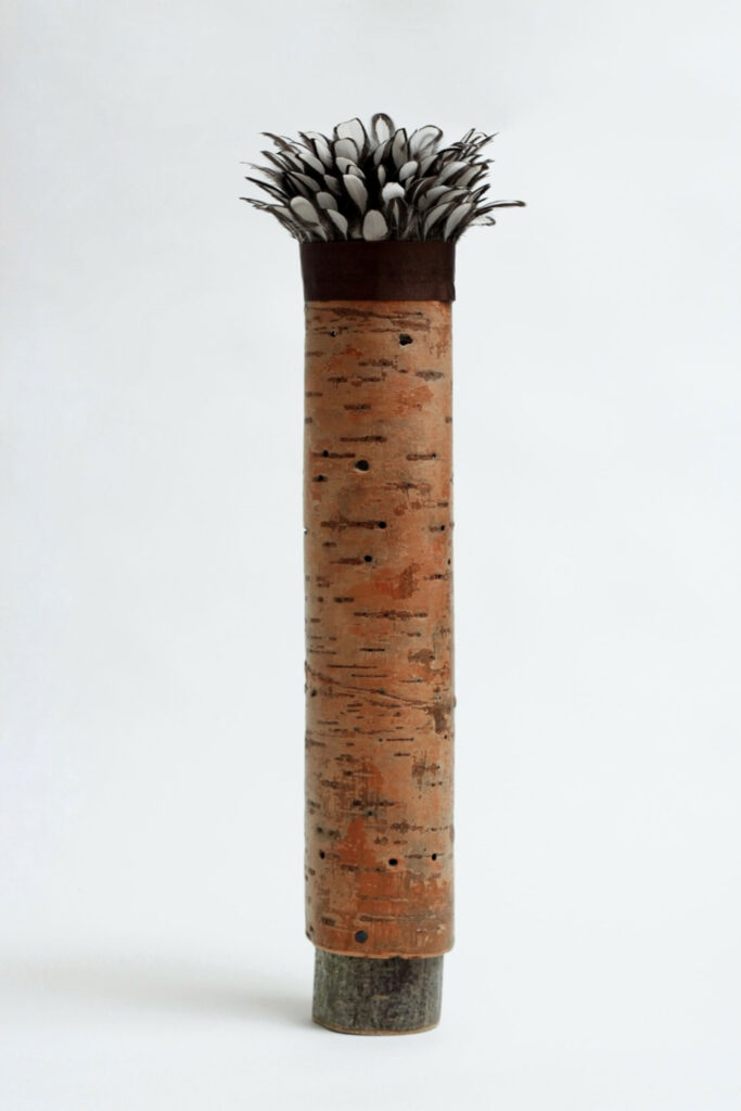 Tall-bark-vessel-with-sebright-bantam-feathers